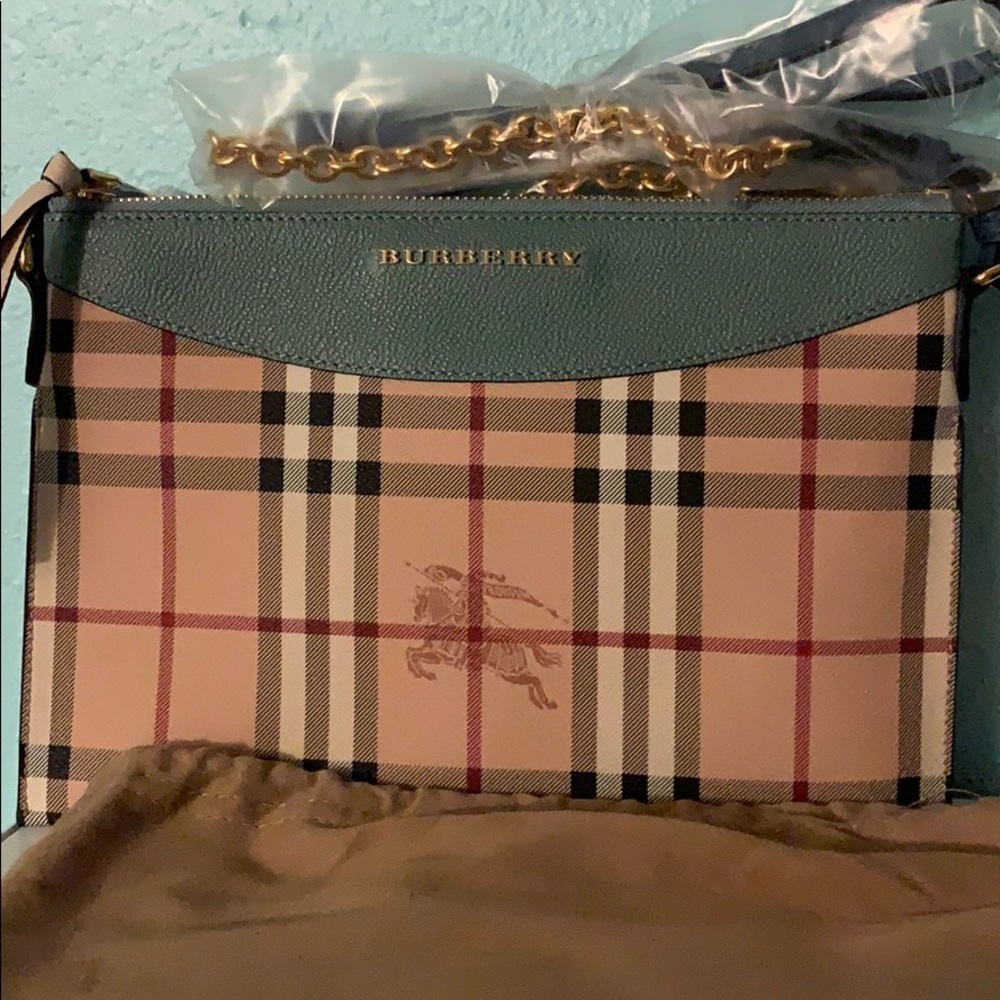 Burberry small cross body/clutch bag blue color